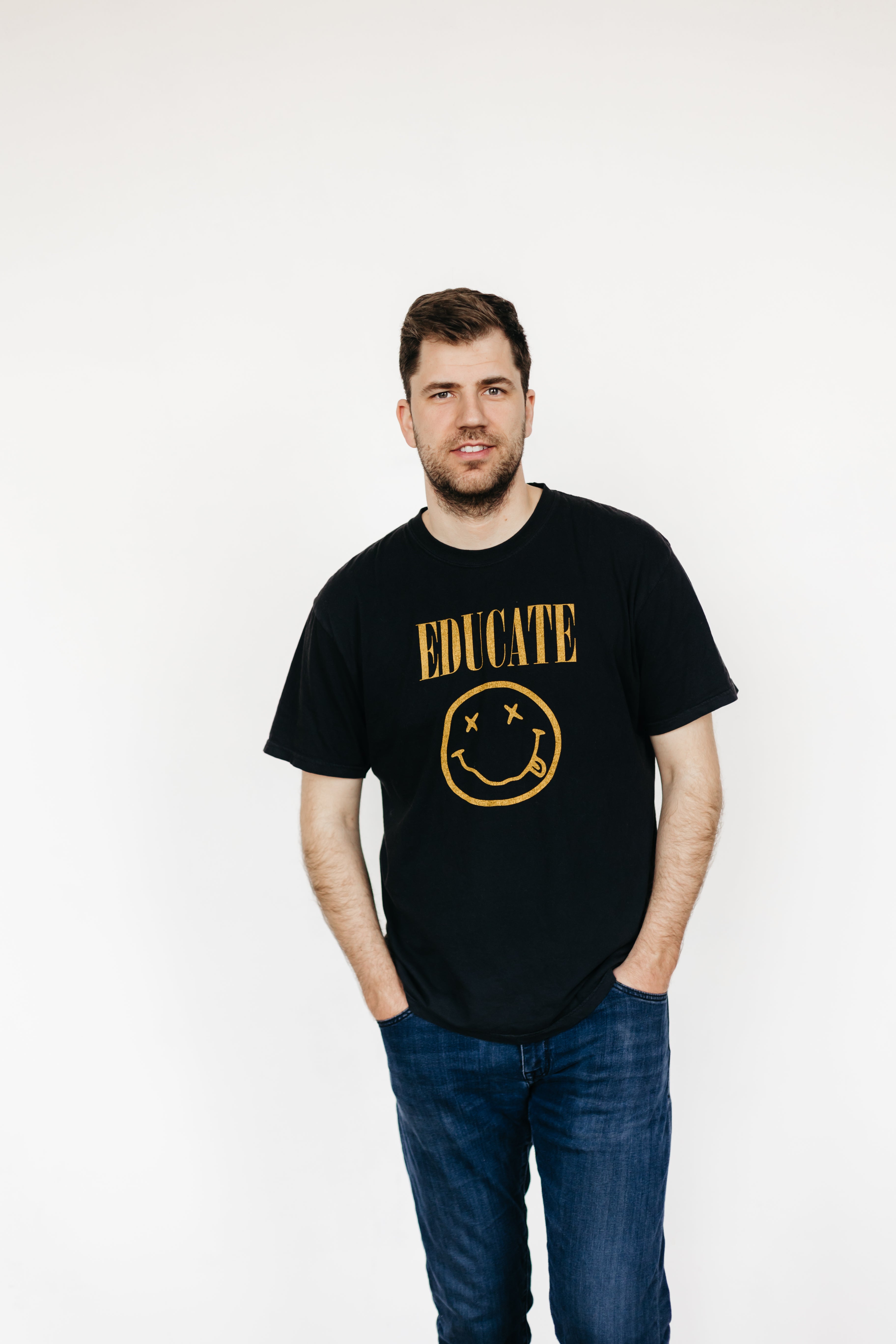 Educate Smiley Face Tee